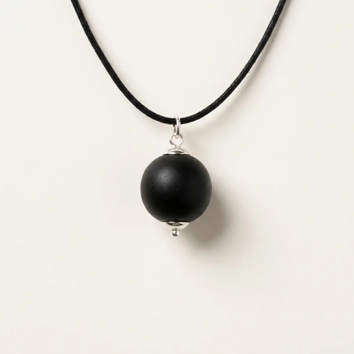 Karungali Pendant — Single Bead Silver-Capped Minimalist
